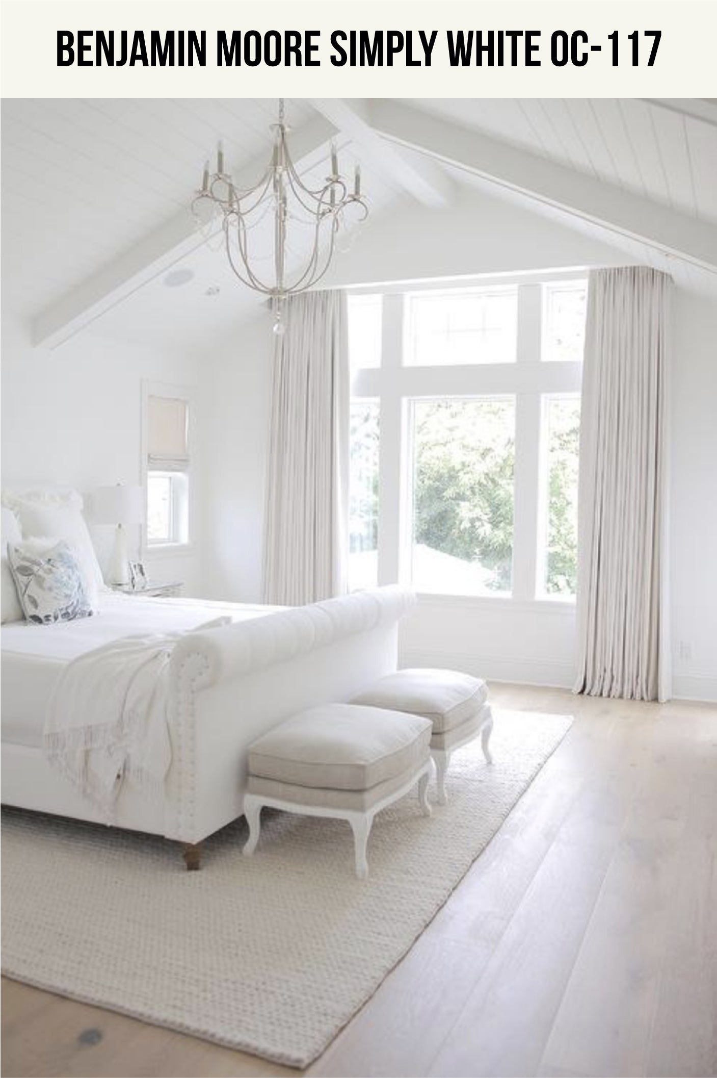 A white bedroom with a chandelier and a bed (Benjamin Moore Simply White OC-117)