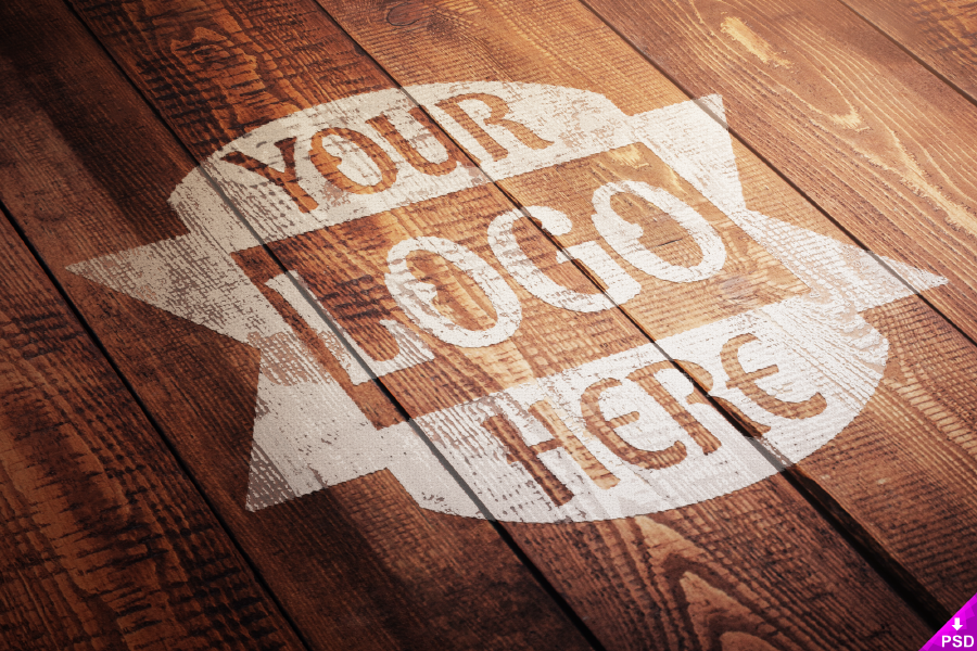 Free Wood Paint Logo Mockup on Wooden Floor - CreativeBooster