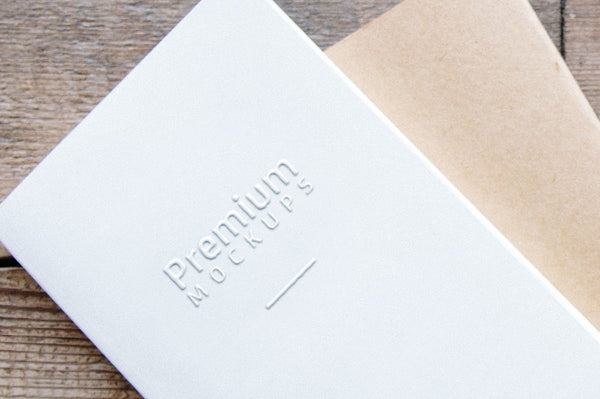 Free White Embossed Greeting Card Mockup - CreativeBooster