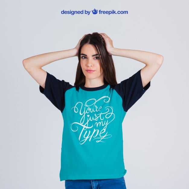 Free Female with a T-Shirt Mockup - CreativeBooster