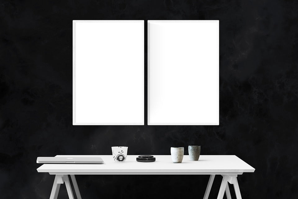 Download Free Double Poster Frame on a Black Background Wall Photo Mockup - CreativeBooster