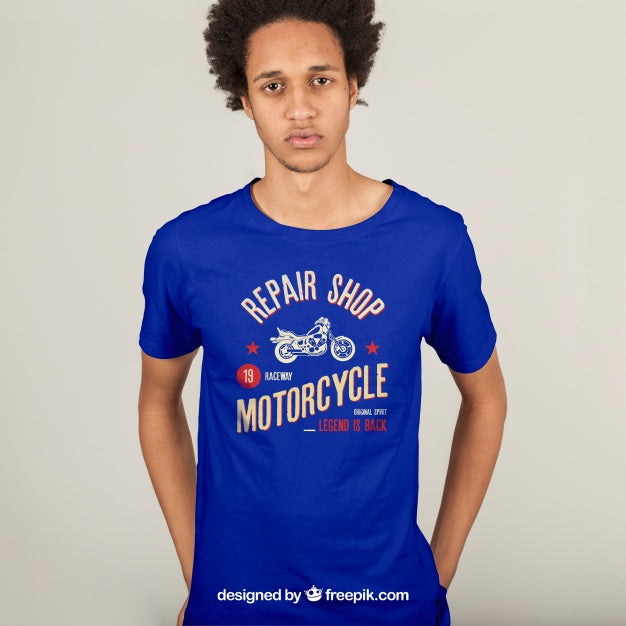 Download Free Man Wearing a Blue T-Shirt Mockup - CreativeBooster