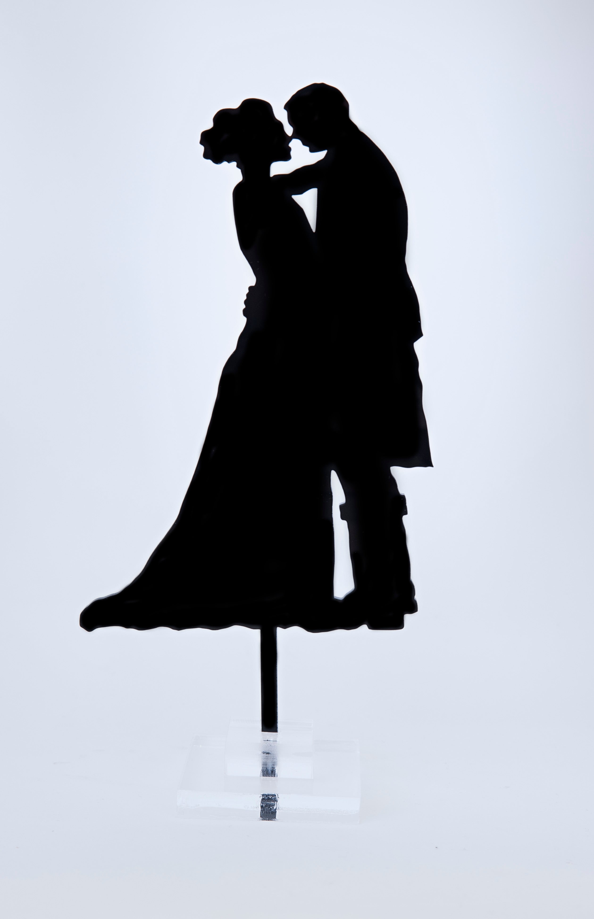 Silhouette Kissing Bride and Scottish Groom in Kilt ...