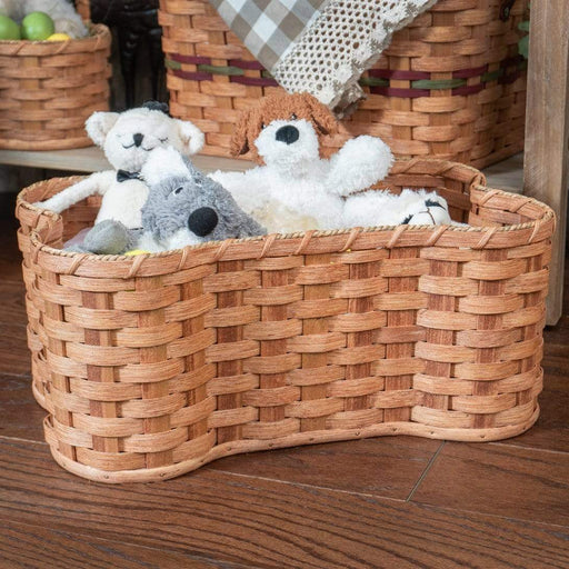 https://cdn.shopify.com/s/files/1/1038/7670/products/pet-beds-bone-shaped-dog-toy-basket-medium-rustic-amish-wicker-storage-plain-28441546686567_512x512.jpg?v=1628073113