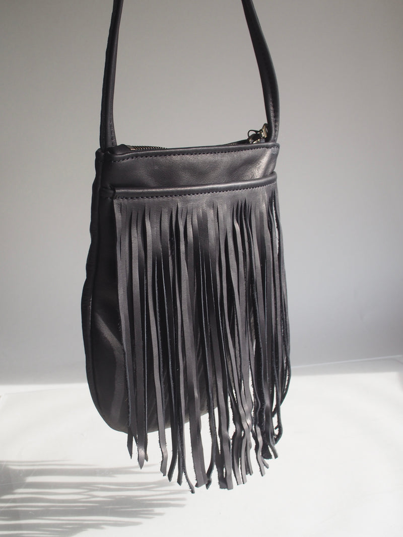 black leather fringe bag