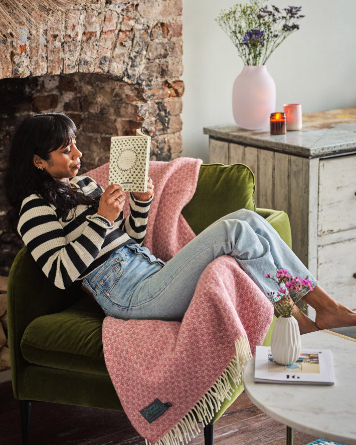 Create a cosy reading nook in your home with wool blankets from The British Blanket Company