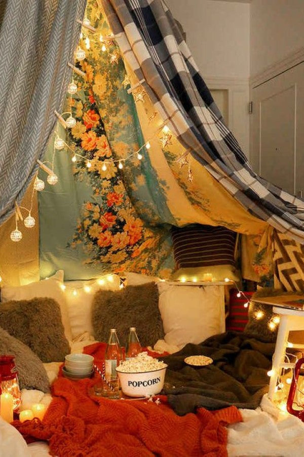 blanket fort with fairy lights
