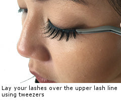 Example of laying your false eyelashes over your upper lash line