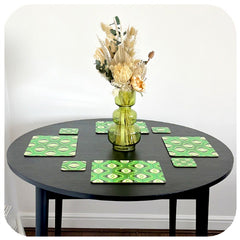 Customer Photo of 70s Green Op Art Placemats and Coasters on Black table with green vase