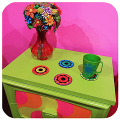 Customer photo of Flower Power coasters in funky, brightly coloured 60s style room