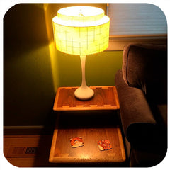 Customer photo - Op Art Coasters on vintage coffee table with vintage lamp | The Inkabilly Emporium