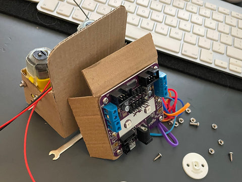 Photo of a partially assembled cardboard robot
