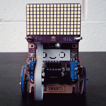 Looping video of a Smartibot robot with a LED matrix mounted above displaying the words 'Hi, I'm a Smartibot'