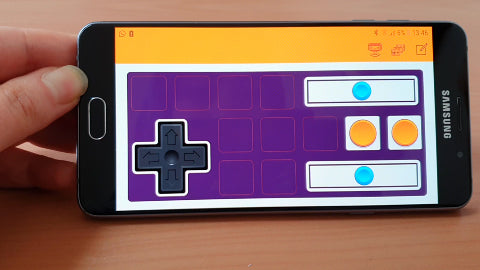 Image of a phone screen with a purple and orange control pad