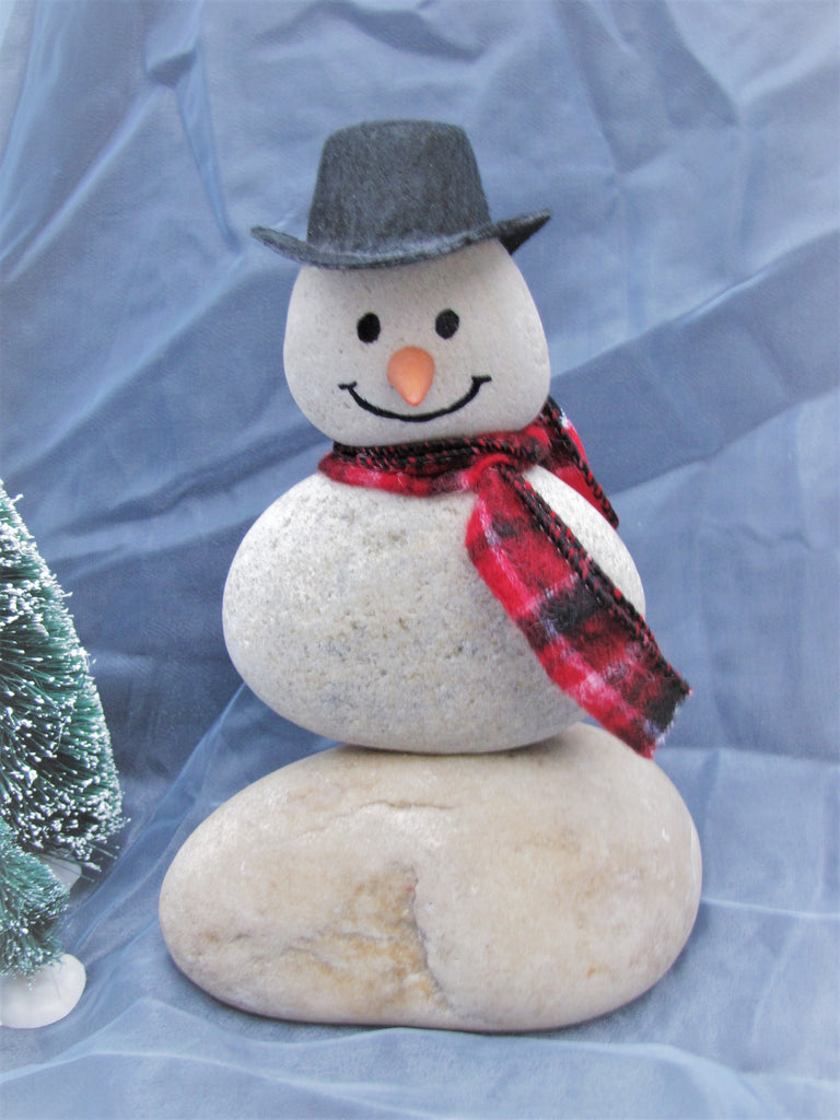 Snowman Made Of Stacked Stone With Black Hat And Plaid Scarf Driftrock Bay Title Snowman Made Of Stacked Stone With Black Hat And Plaid Scarf Driftrock Bay