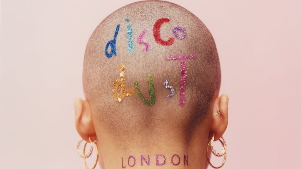 disco dust gliiet london on the back of a shaved head