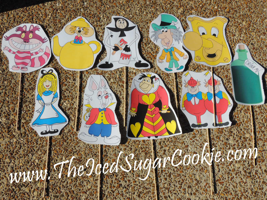 https://cdn.shopify.com/s/files/1/1041/8038/files/Free_Alice_In_Wonderland_Photo_Booth_Props_Printables_by_The_Iced_Sugar_Cookie_Mad_Hatter_Cheshire_Cat_Tweedle_Dee_Dum_White_Rabbit_Queen_of_Hearts_Doorknob_Drink_Me_Playing_Card_Guard_Birthday_Party_2_1024x1024.jpg?16903622909935851541