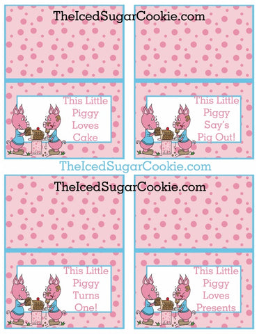 This Little Piggy Birthday Party Food Label Tent Cards is a printable digital download. If you're throwing a "This Little Piggy" birthday party then these food cards will work great for you! This Little Piggy Birthday Party Food Label Tent Cards-This Little Piggy Turns One Nursery Rhyme Party Printable Template by The Iced Sugar Cookie. 1. This Little Piggy Loves Cake 2. This Little Piggy Say's Pig Out! 3. This Little Piggy Turns One! 4. This Little Piggy Loves Presents 5. Piggy Cakes 6. Piggy Food 7. Piggy Treats 8. Pig Slop 9. Piggy Drinks 10. Piggy Punch 11. Piggy Candy 12. Pig Out! 13. Piggy Cotton Candy 14. Piggy Pizza 15. Piggy Cookies 16. Piggy Pie 17. This Little Piggy Turns Two! 18. This Little Piggy Turns Three! 19. This Little Piggy Turns Four! 20. This Little Piggy Turns Five!