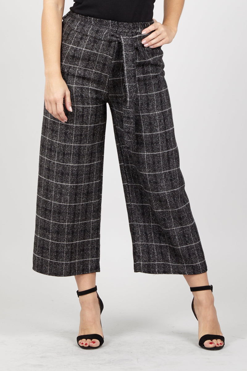 black and white cropped trousers