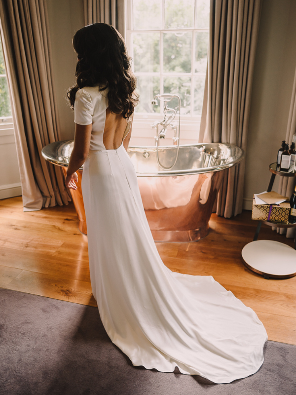 Real Bride Charlotte in backless bodysuit and wedding dress