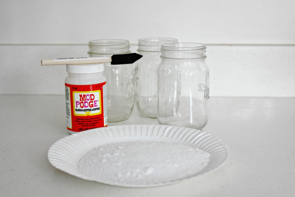 Spread Epsom salts on a plate to create the Epsom salt luminaries