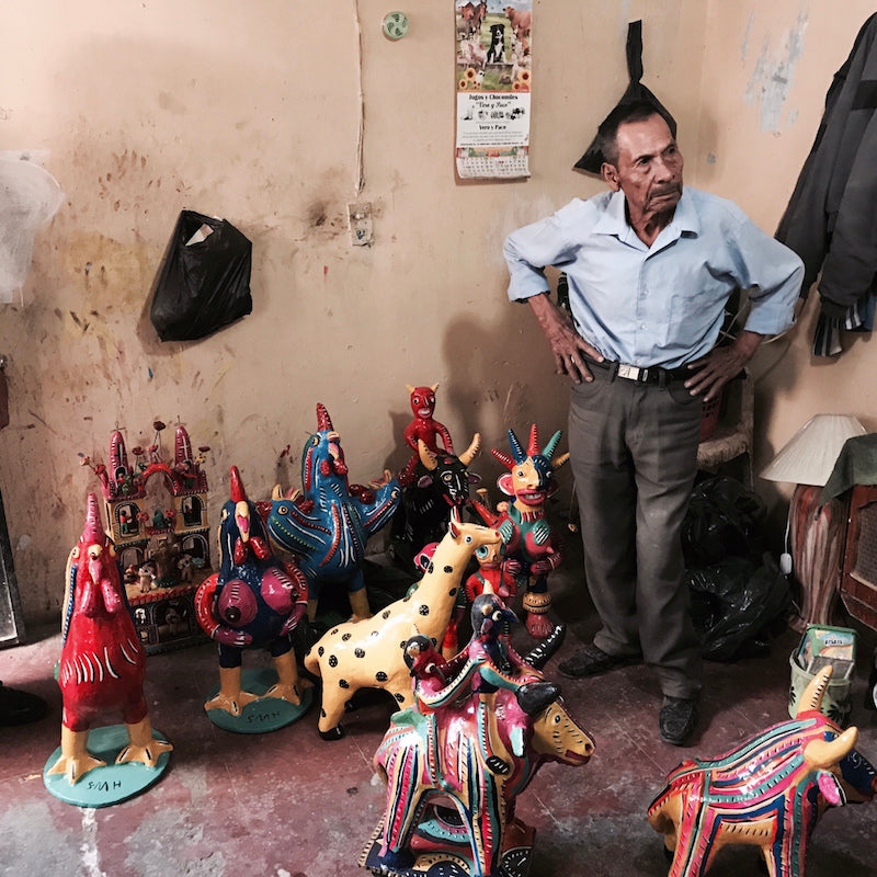 Mexican Folk Artist Serapio Medrano with his ceramic sculptures at his home in Tonala