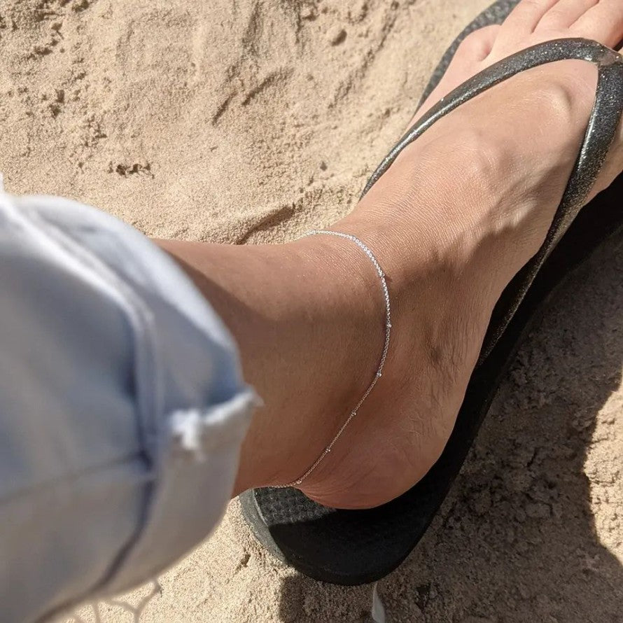 Candid Silver Flip Flop Feet