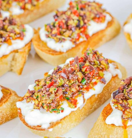 Burrata Crostini made with Kalamata Olive Tapenade