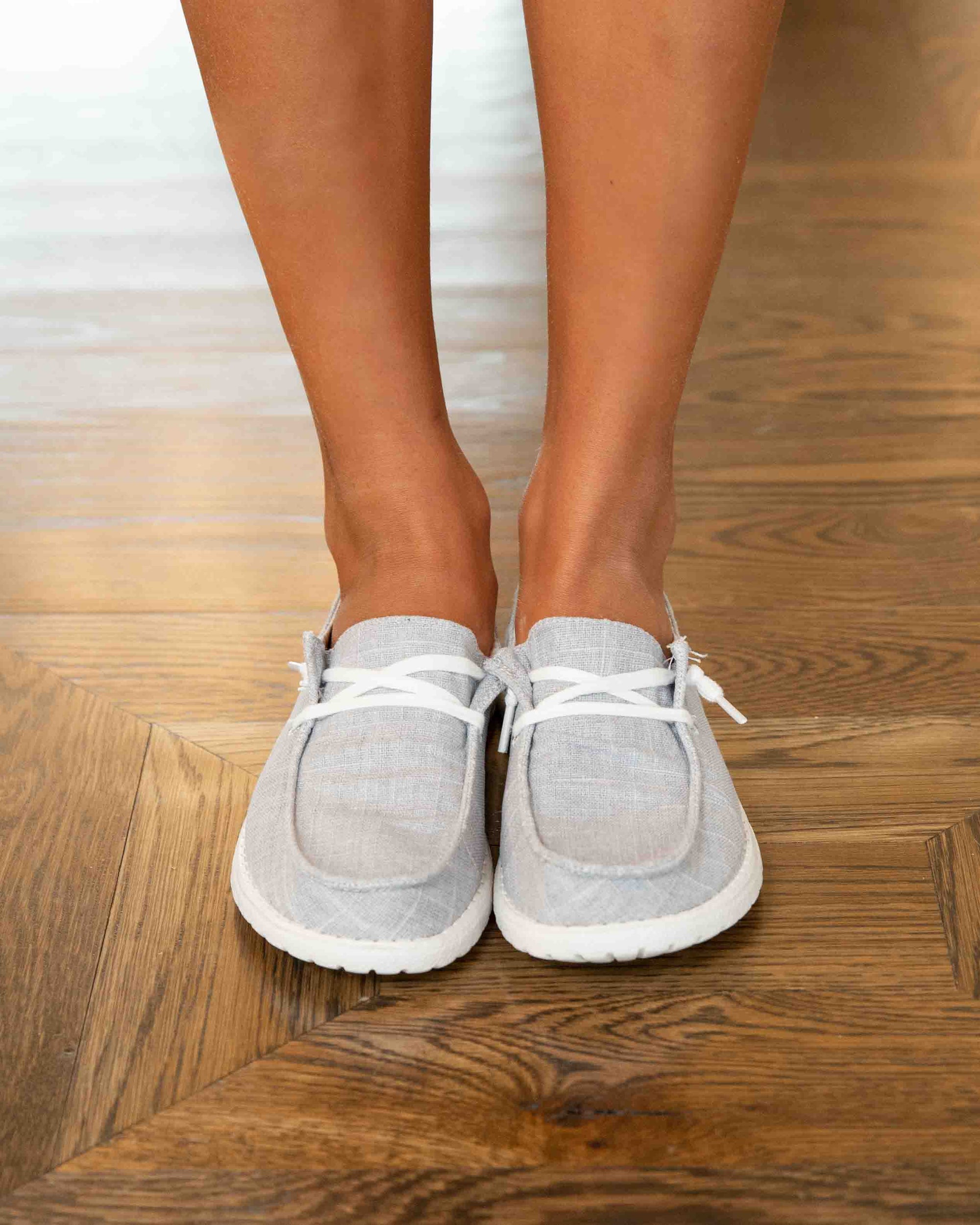 light grey slip on sneakers