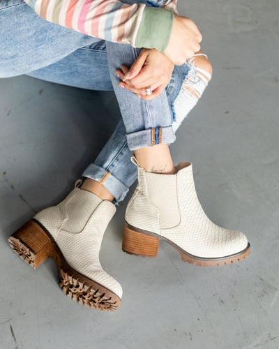 ivory snakeskin booties