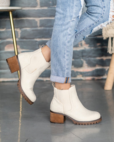 ivory snakeskin booties