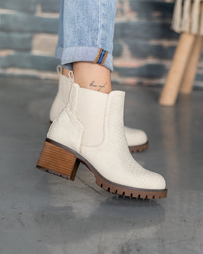 ivory snakeskin booties