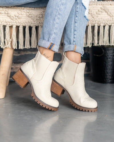 ivory snakeskin booties