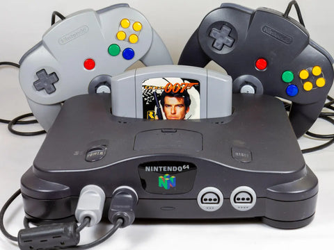 A classic Nintendo N64 console with a game cartridge of a Goldeneye 007 N64 game