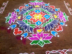 Square rangoli on pavement