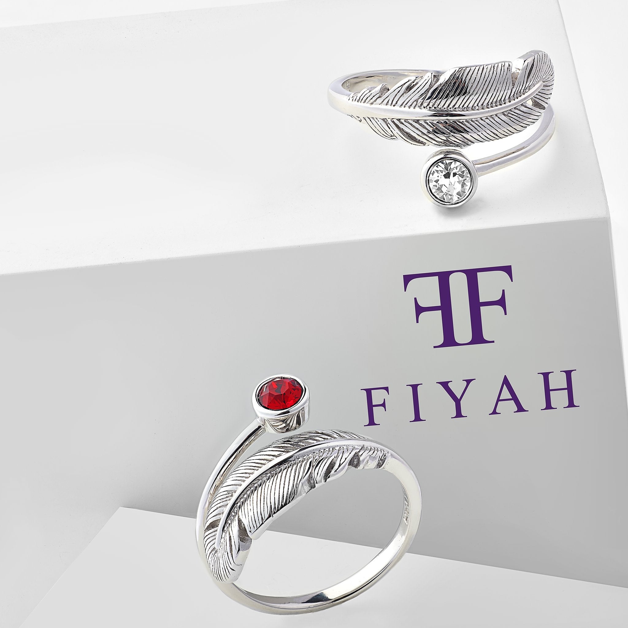 Feather birthstone rings display