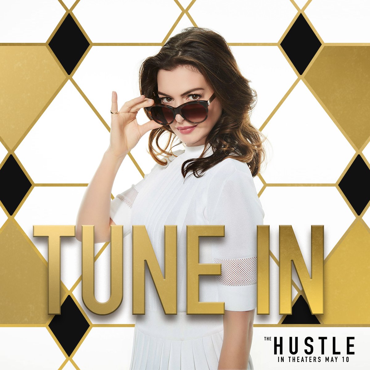 Anne Hathaway in movie poster for The Hustle