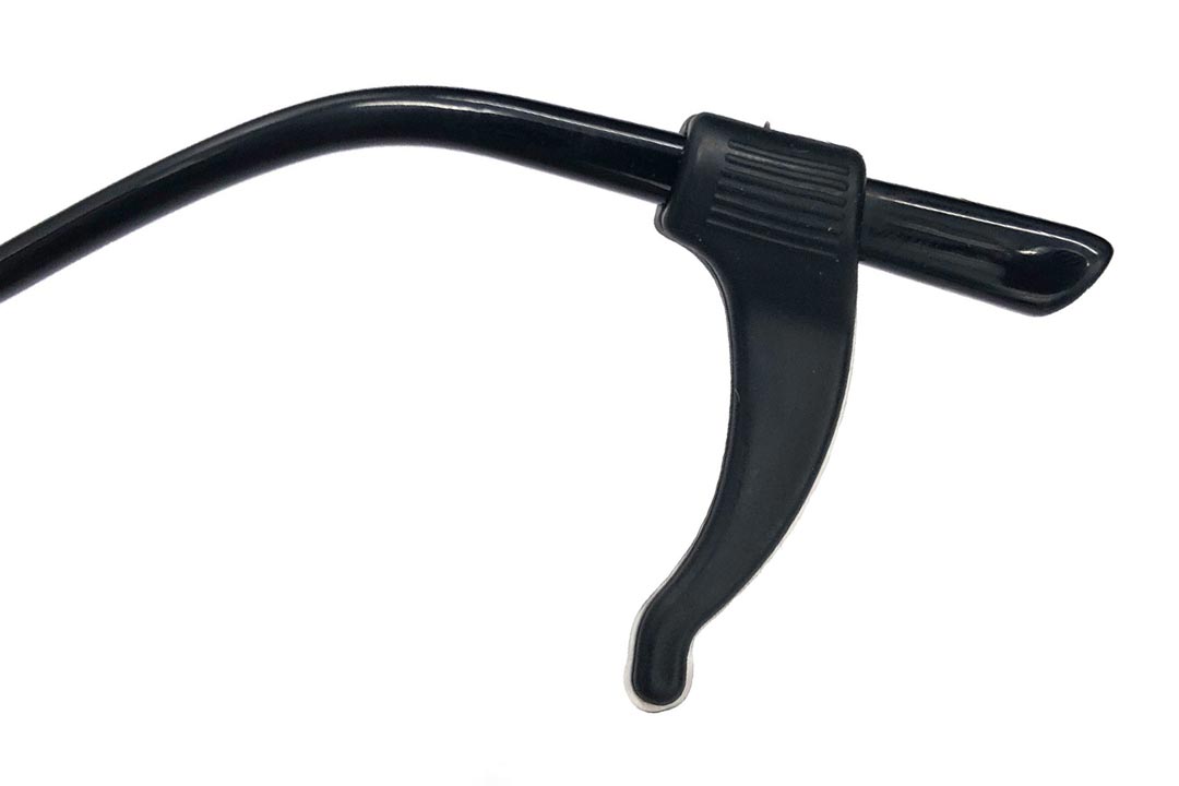 Close view of black sunglasses hook attached to sunglasses temple arm