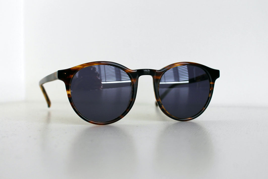 Close view of unbranded round tortoiseshell sunglasses