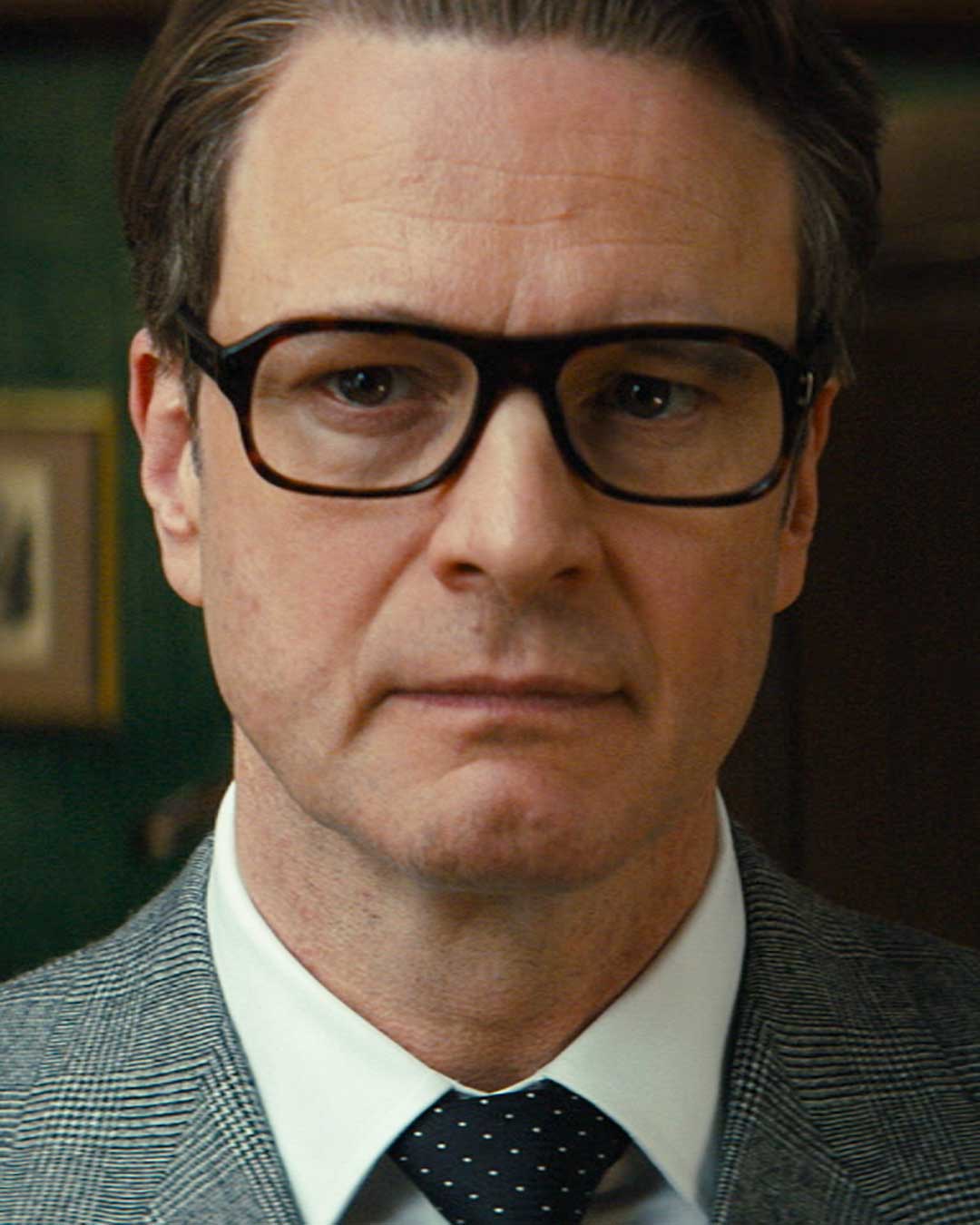 Colin Firth wearing thick rimmed eyeglasses frame