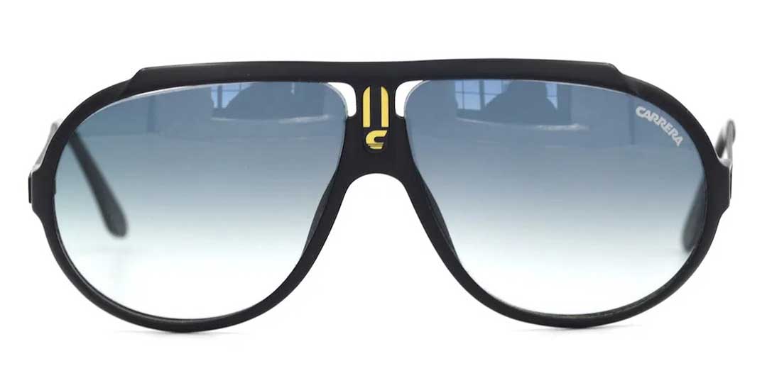 Front facing view of black Carrera 5512 sunglasses with grey gradient lenses