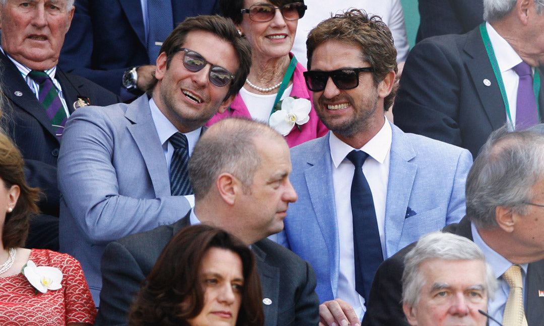 Gerard Butler and Bradley Cooper together in the crowd at Wimbledon wearing suits and sunglasses