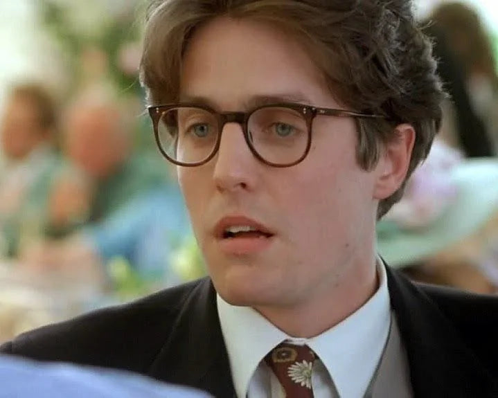 Hugh Grant Wearing Glasses in Four Weddings and a Funeral