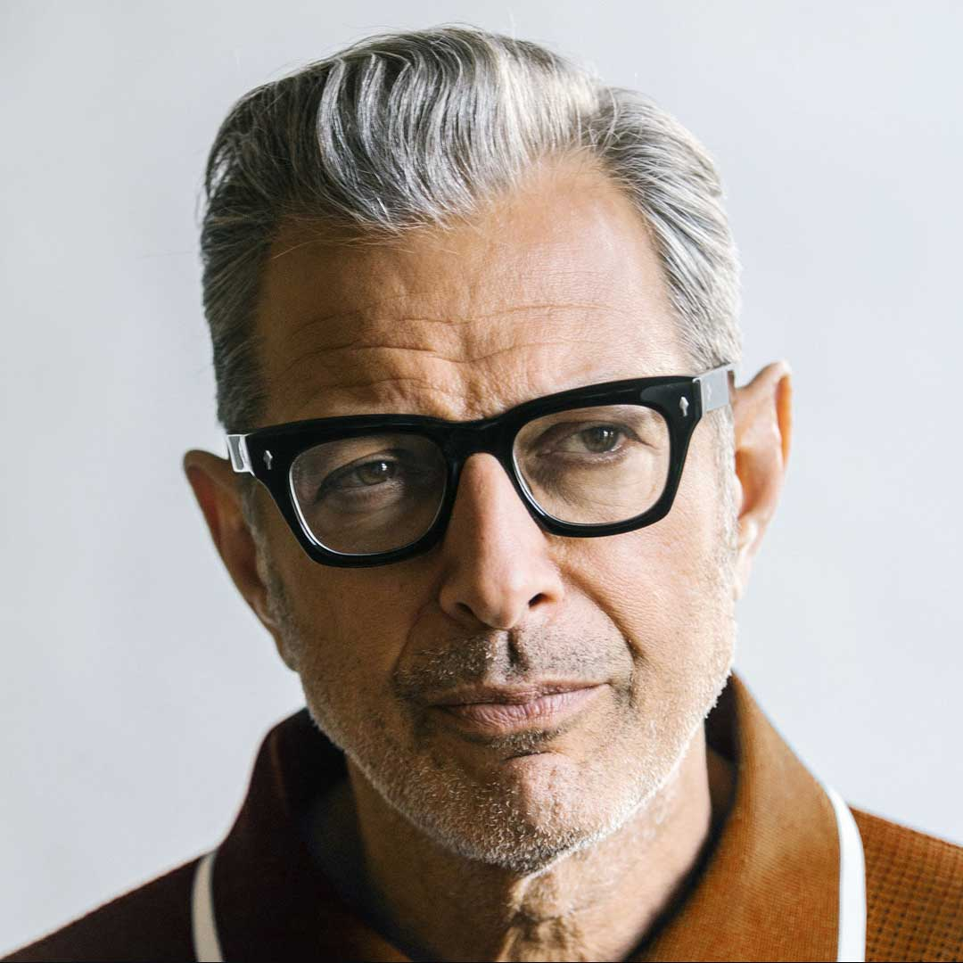 Jeff Goldblum wearing thick framed glasses