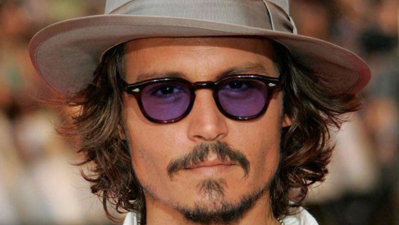 Johnny Depp Wearing Moscot Lemtosh Glasses with Purple tinted lenses