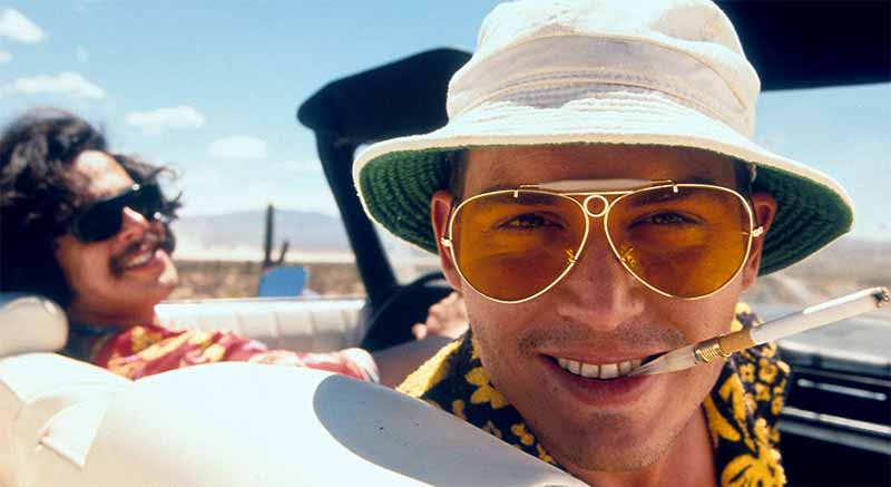 Johnny Depp wearing Ray-Ban 3138 Shooter sunglasses with yellow tinted lenses in fear and loathing