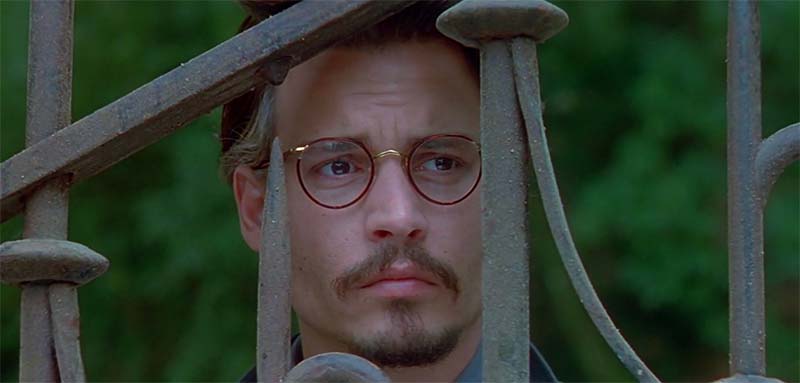 Johnny Depp wearing Saville Row glasses in the ninth gate