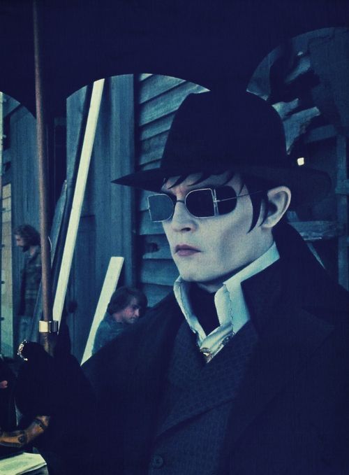 Johnny Depp wearing sunglasses in the dark shadows film