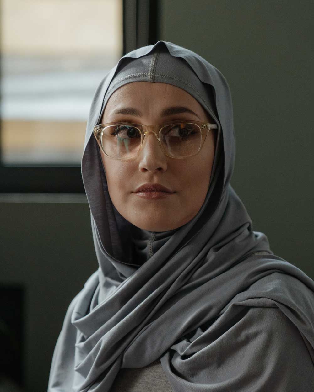 Lady wearing hijab and nude crystal eyeglasses frame