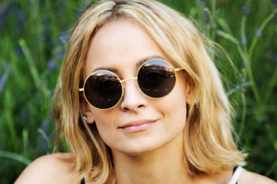 Nicole Richie wearing circular wire sunglasses frame